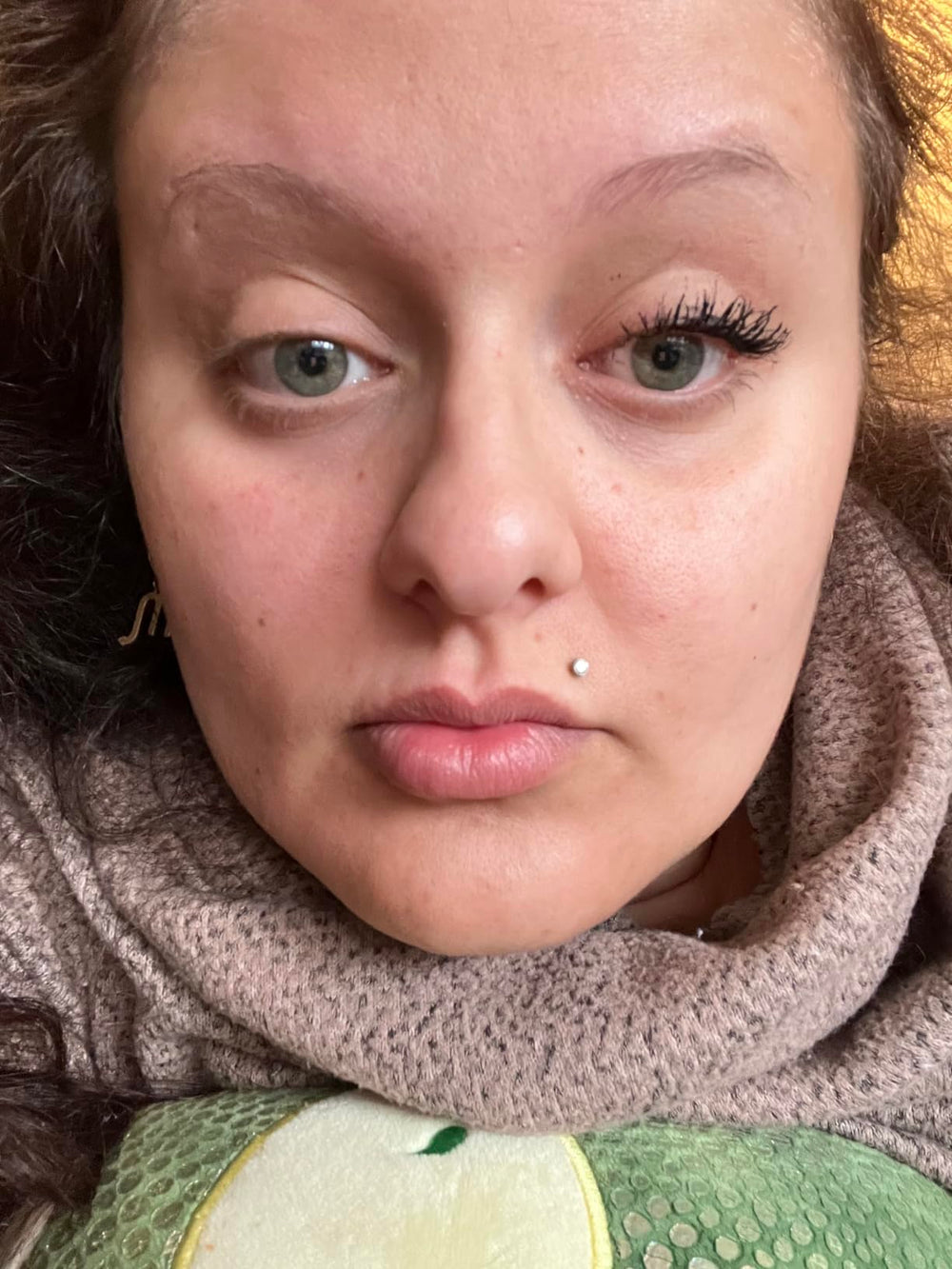 Customer showing longer-looking lashes